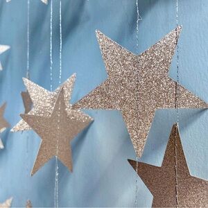 Strand of 3ft gold sparkly bohemian zodiac star garland
